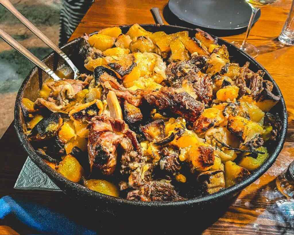 Meat and potatoes from traditional Croatian peka dinner in Dubrovnik