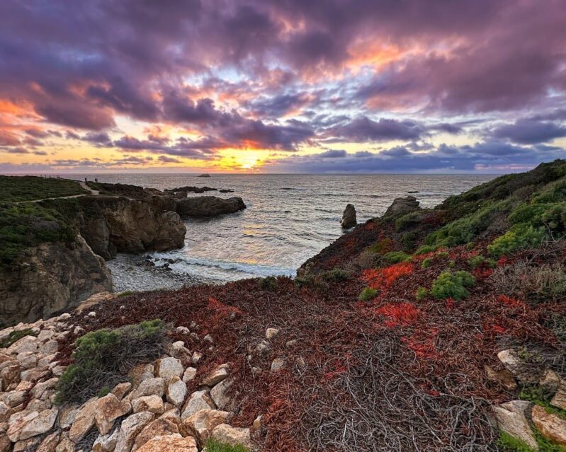 Big sur ocean vista with dramatic clouds, a must-see on a family road trip in Northern California with kids