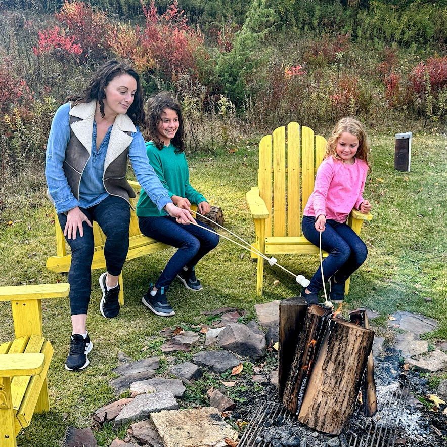 Adventurous Tastes family roasting marshmallows during their Catksills family vacation