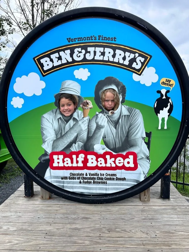 Two girls posing for a photo in a Ben & Jerry's carton at the factory in Vermont
