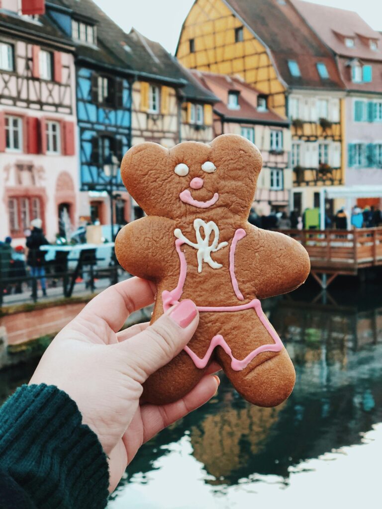 The best christmas markets in europe have delicious holiday treats like this gingerbread man.