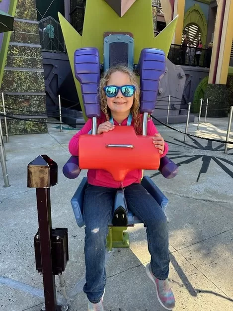 Little girl preparing to ride one of the besr rides at Universal Orlando