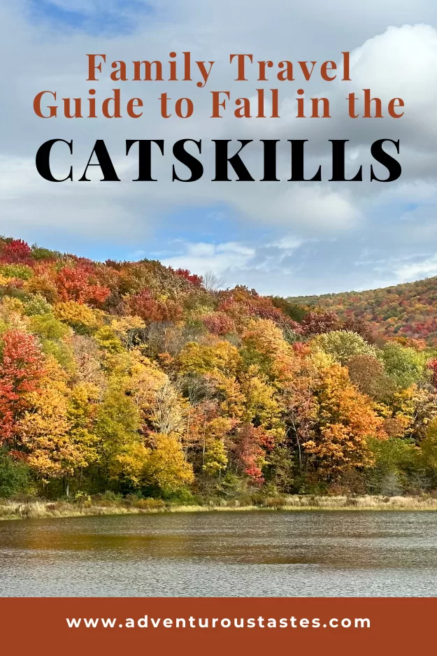 Family travel guide to fall in the Catskills | fall foliage by a lake in New York's catskill region