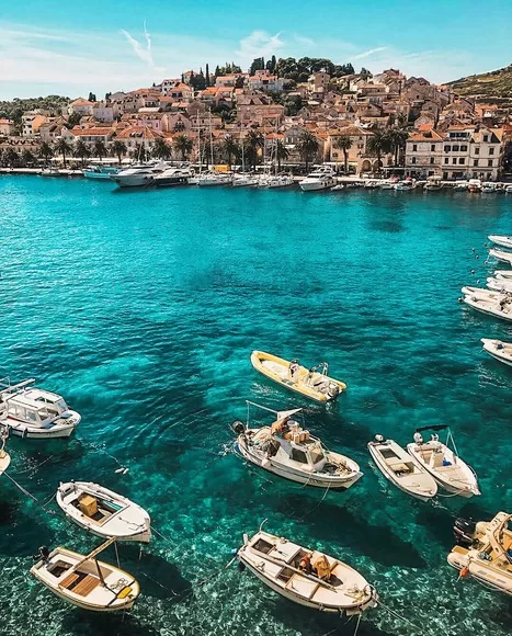 small boats in the water in Hvar, Croatia. Sailing is one of the best things to do in Hvar.