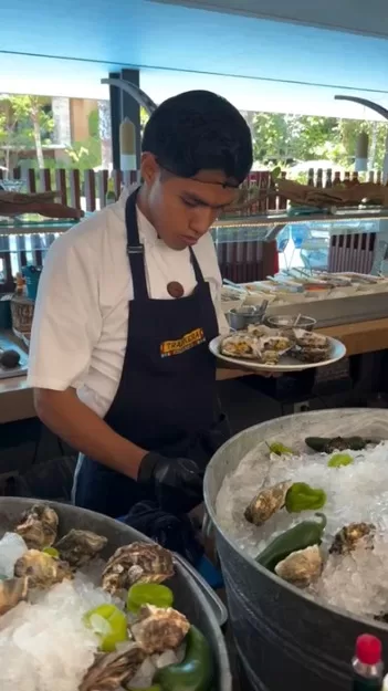 Man making ceviche at Xcaret Hotel Mexico