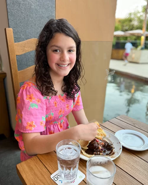 Girl from Adventurous Tastes enjoying a delicious lunch at Xcaret Hotel in Mexico