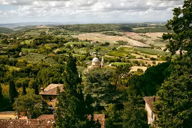 Clouds over the town of Montepuciano, Italy - one of the best places to stay in Tuscany