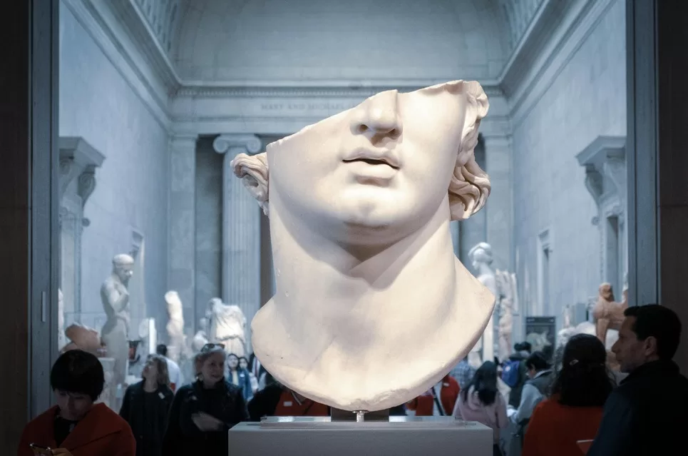 A large bust from the Met with the top half of the head broken off.