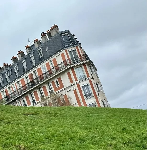 The famous sinking house optical illusion in Montmartre, Paris