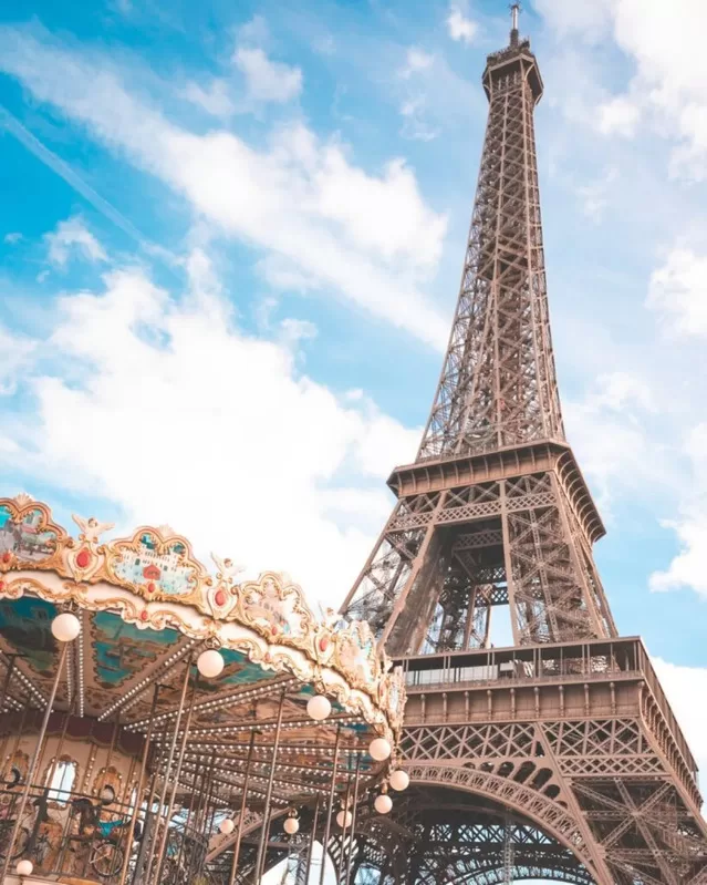 The Eiffel Tower and a carousel - a must see when in Paris with kids