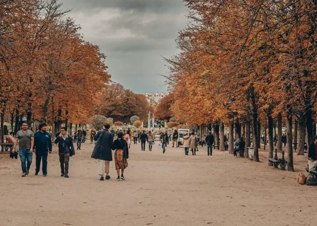 People strolling in Jardin de Luxembourg in fall