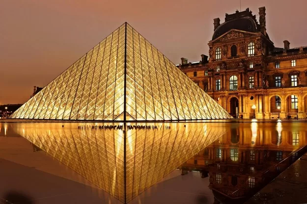 The Louvre at night - a perfect destination when visiting Paris with teens