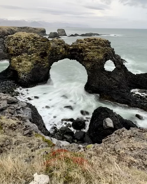 Dramatic rock formation and sea in Iceland