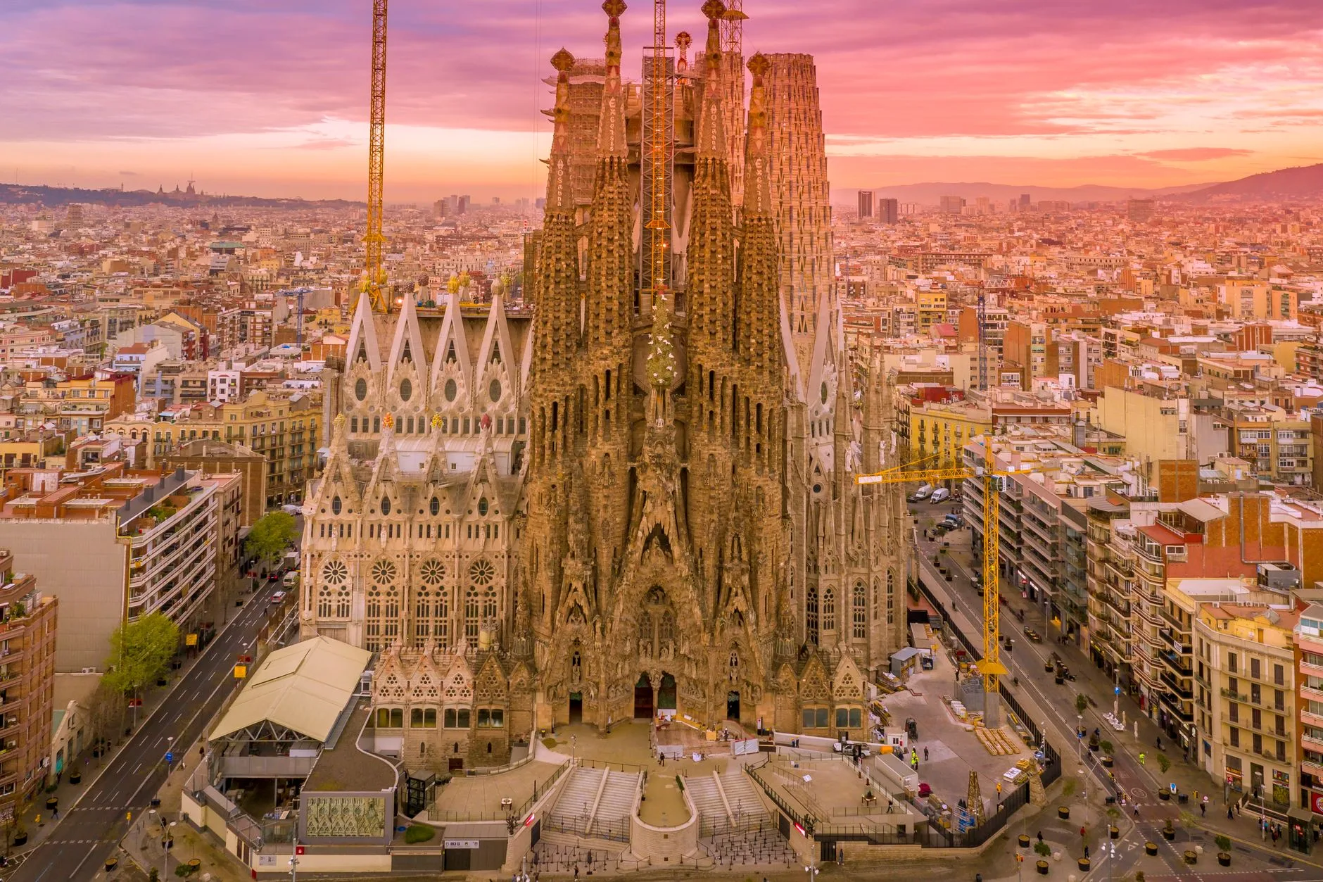 stunning aerial view of sagrada familia at sunset - Barcelona is a great option for where to live in Spai with kids